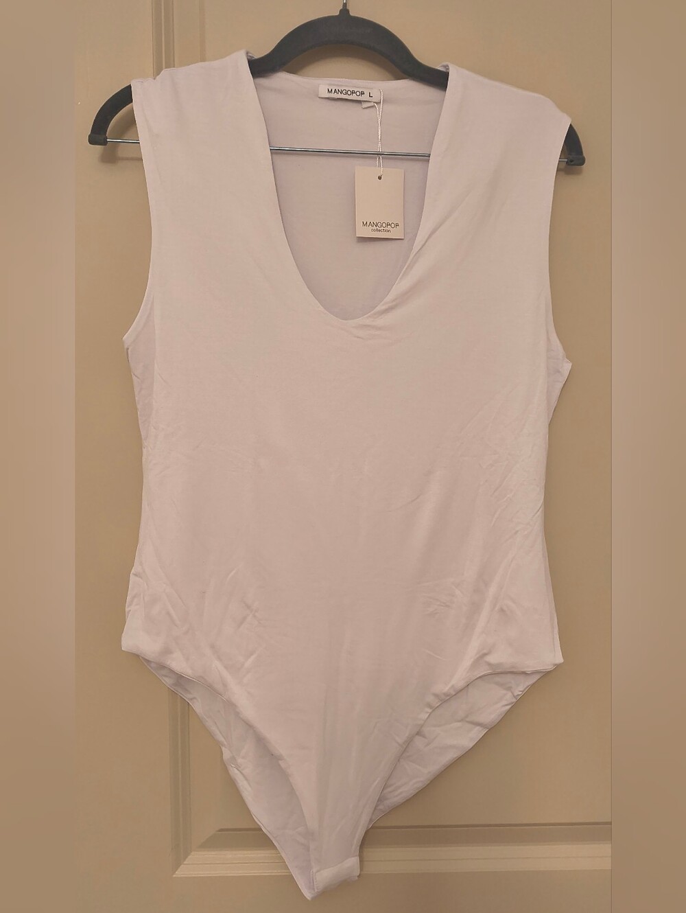 Mango Sleeveless V-Neck Bodysuit in White